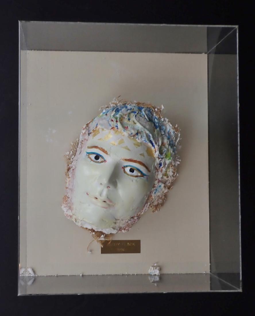 Audrey Flack (born 1931) Mask Sculpture: Untitled Mask, signed, dated and mounted in a plexi Shadow box Mixed Media Mask Sculpture by Audrey Flack. Back marked Inventory #8129 Imperfections. Height: 17 1/4"; Width: 14 1/4"; Depth: 6 3/4". ST