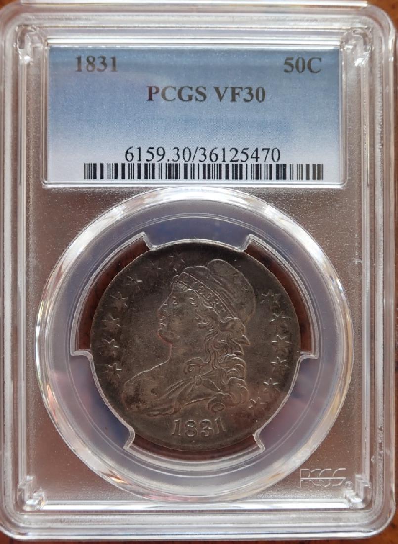 1831 Capped Bust 50 Cent Lettered Edge MS: 1831 CAP BUST 50C Lettered Edge MS PCGS Graded Case reads: "1831 50C PCGS VF30 6159.30/36125470." (money, collecting, Numismatics, currency, eagle, E Pluribus Unum, Liberty). STERLING ASSOCIATES STRIV