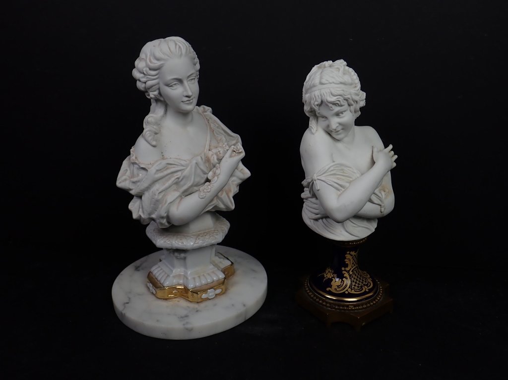 Pair of Neo-Classical Busts, signed: Two Neoclassical bust sculptures depicting women: One (1) sculpture with ceramic pedestal with gilded edge and marble base, signed "Monet" on reverse; One sculpture with Sevres makers mark with blue-p