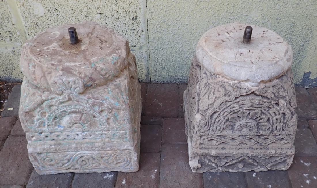 Pair of Carved Cement Pillar Bases: Two carved cement bases. Architectural elements. Heavy. Indoor / outdoor. Imperfections, wear, paint residue. Height 14"; Width: 11"; Depth: 11". STERLING ASSOCIATES STRIVES TO PROVIDE ACCURATE, OBJEC
