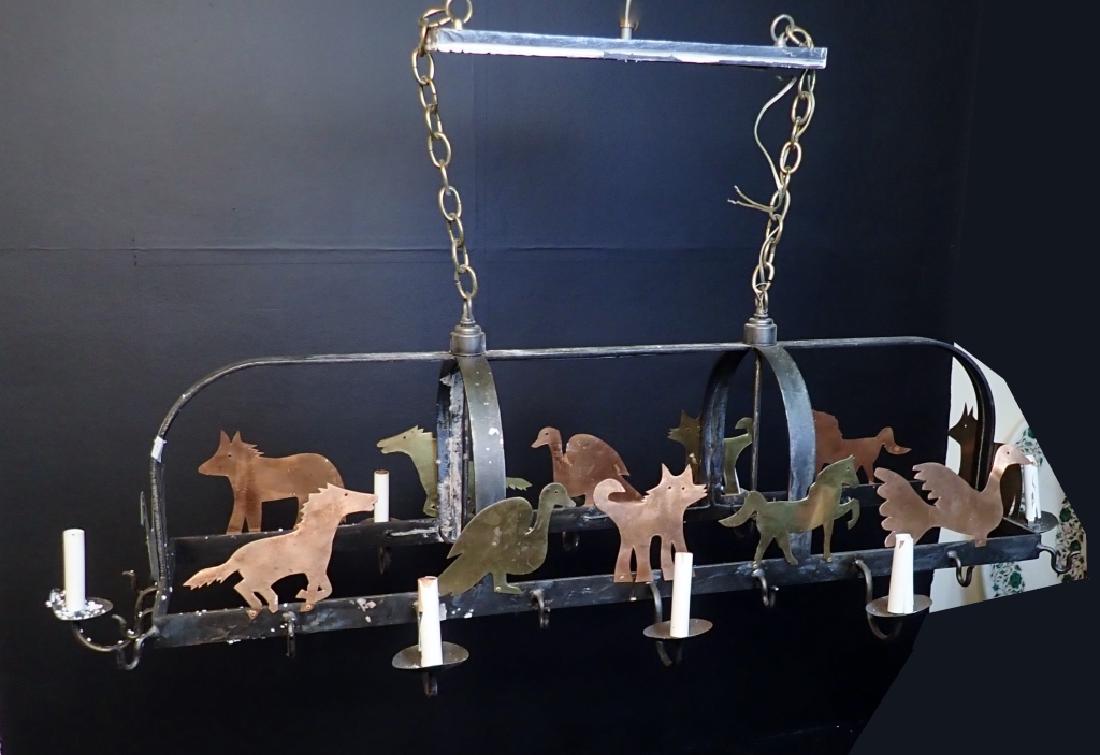 Vintage Island Pot Rack as Chandelier: Lighted Mixed Metal Hanging Pot Rack is a striking statement piece. Iron rack features animals in brass & copper. Horses, Geese, Cats and more. Imperfections. Untested electrical. Sticker / tape resid