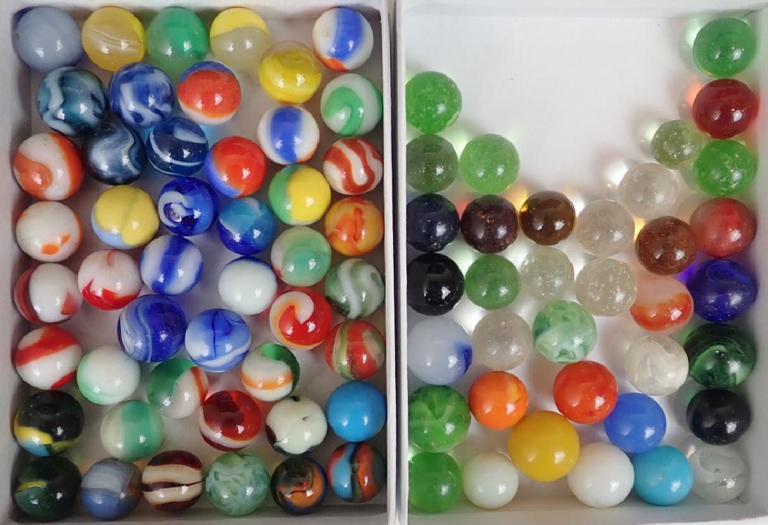 Vintage Glass Marble Collection: Large assortment of vintage glass marbles. Various styles, colors and sizes. May include: Akro Agates, Master Marbles, Oxblood, Agate swirl, Peltier, Ravenswood, slags, patches, corkscrews, ribbon, so