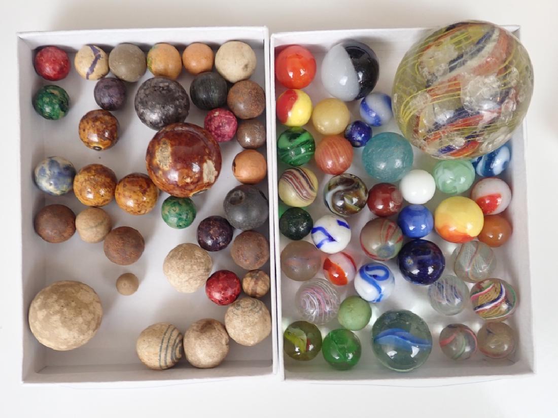 Antique & Vintage Glass & Clay Marble Assortment: Large assortment of antique and vintage marbles. Various sizes, styles and ages. Possibly may include: Clay, civil war era, stone, Benningtons, pontils, crockery, pee wee, German, Core Swirl, Peltier,