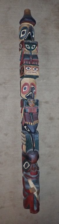 Vintage Carved Wood Polychrome Totem Pole: Native American, possibly Pacific Northwest (USA and Canada), Haida or Tlingit peoples, ca. A hand-carved and hand-painted wooden model totem pole depicting several animal spirits including: a Raven, 