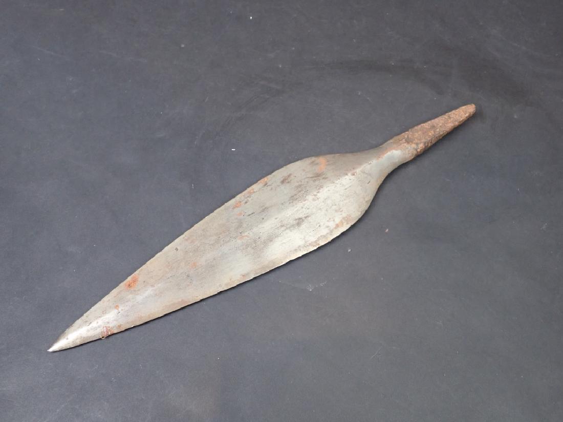 Vintage Spear Head: Spear head. No noticeable maker marks. No pole. Imperfections, age. Length: 12"; Width: 2 1/4". (weapons, collectible, antique) STERLING ASSOCIATES STRIVES TO PROVIDE ACCURATE, OBJECTIVE, & FAIR INFOR
