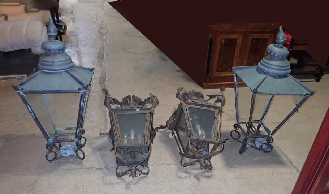 Collection of 4 Vintage Lanterns: Four vintage lanterns include two hanging and two post lanterns (without posts). Imperfections include broken or missing glass. Age, wear. Untested. height: 39"; Width: 17"; Depth: 17". (lighting, ind
