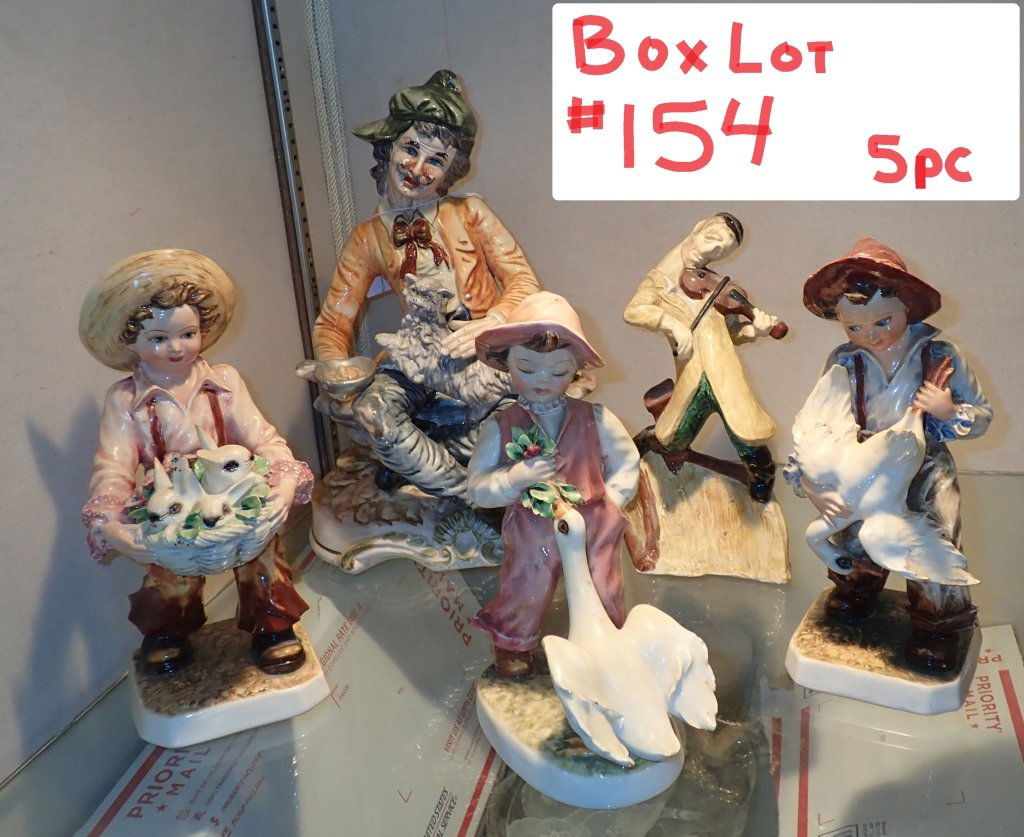 Box Lot #154 Porcelain Figurine Grouping: 5 piece lot includes: Large Capodimonte porcelain figurine depicting a man feeding a cat. Maker's mark inside near base. Dimensions: 13.5" H x 9" W x 6.75" D., & Carlo Mollica Porcelain Figurines, sta