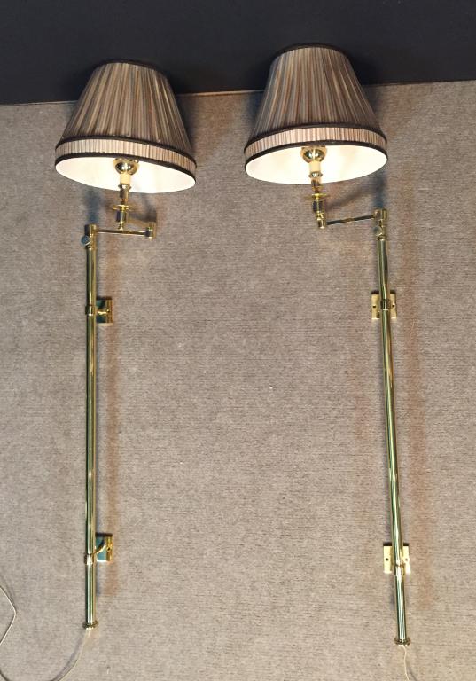 Solid Brass Swing Arm Wall Sconce Pair: Pair of brass swing arm tall telescoping wall sconces with shades. Height: 51" - 66" (fully extended). Shade width: 12". STERLING ASSOCIATES STRIVES TO PROVIDE ACCURATE, OBJECTIVE, & FAIR INFORMATION