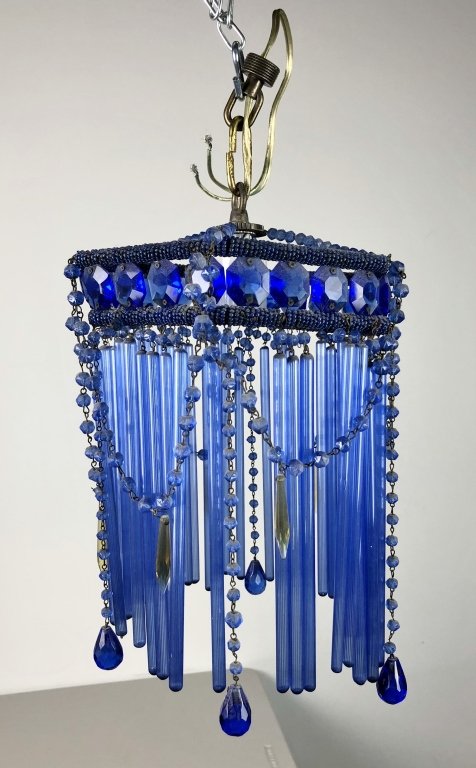 Art Deco Blue Glass Rod Hanging Chandelier: Chandelier features hanging glass rods, crystals and beadsHeight: 13"; Width: 7". Includes loose pieces and canopy shown. (reeded glass rods, lighting, interior design)STERLING ASSOCIATES STRIVES TO P