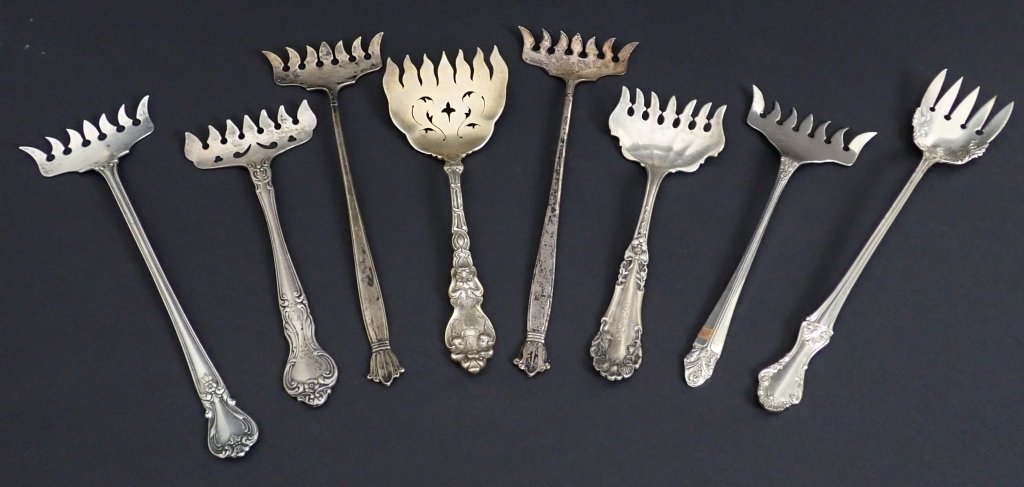 Sterling Silver Sardine Serving Forks: Eight assorted sterling silver tined serving forks.Various styles, patterns and sizes. Makers marks include: Amaryllis by Manchester, Wolfenden and more. Total approximate weight: 216 grams. Longest: 