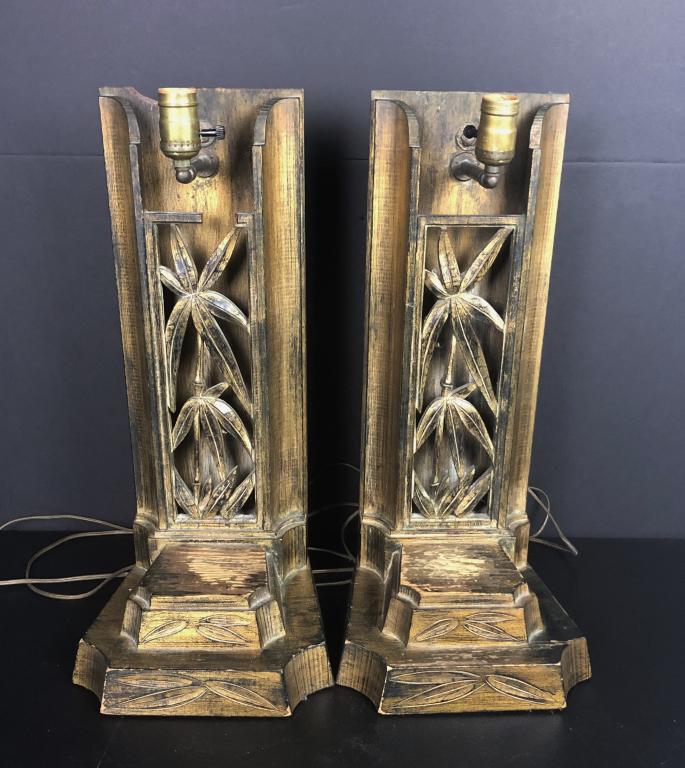 Carved Asian Style Pair of Lamps with Shades: Set of two James Mont Chinoiserie table lamps with Open Worked, bamboo design. Height without shade: 23"; Width: 7 3/4". Imperfections. Unmarked STERLING ASSOCIATES STRIVES TO PROVIDE ACCURATE, OBJECT