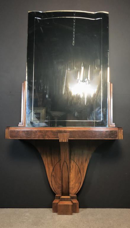 Art Deco Console Table with Mirror: Console table with fitted mirror. Imperfections. Total height with mirror: 82 1/2"; Height to table top: 33 1/4"; Width: 42"; Depth: 17 1/4". STERLING ASSOCIATES STRIVES TO PROVIDE ACCURATE, OBJECTIVE