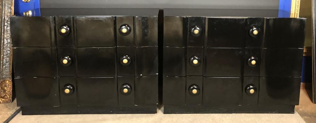 Pair of Black Lacquered James Mont Dressers: Pair of Mid-Century Modern signed chest of drawers or bachelor chests by James Mont. Black Lacquered drawer fronts with large round, two-tone pulls. Heavy solid waved shape block drawer fronts. Black 