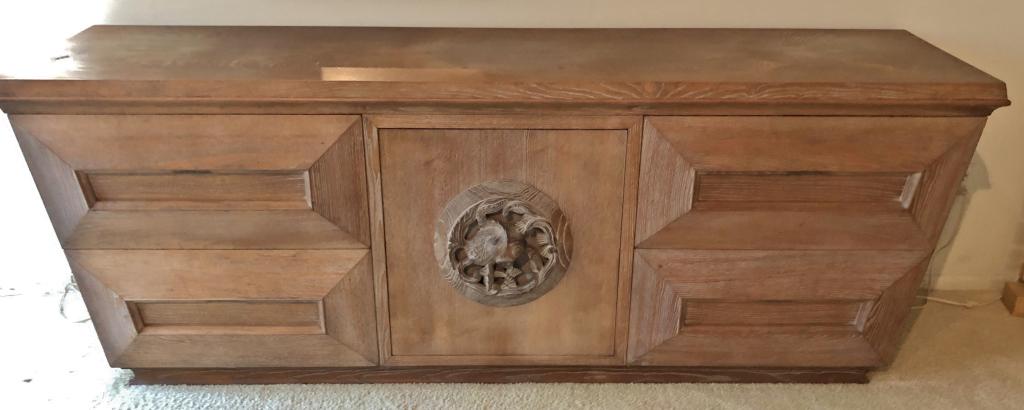 James Mont Buffet with Koi Fish: Large Rare Fish Cabinet by James Mont, large cabinet is by James Mont. The cabinet is a beautiful cerused oak and has a slight trapezoidal shape. Center door with fish medallion is rotating door which