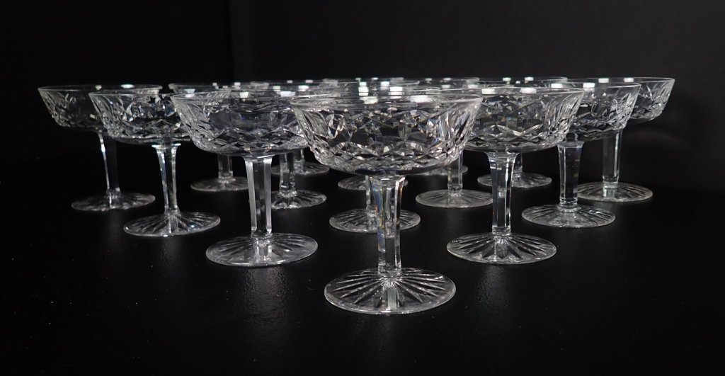 Waterford Lismore Champagne / Sherbet Glasses, 16: 16 Champagne Coupe / Tall Sherbet crystal glasses in the Lismore pattern by WATERFORD.Twelve glasses.Makers marks on bottoms.Wear to some makers marks.Height : 4 1/8 in(Drinking glasses, wine, cocktai