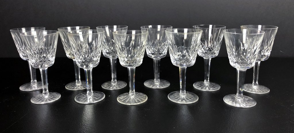 Waterford Crystal Lismore Wine Glasses, 11 pcs.: Eleven Claret Wine glasses in the Lismore pattern by Waterford Crystal. Height: 5 7/8 in. Makers marks on some bottoms. Wear to some makers marks. (Drinking glasses, wine, cocktail, Crystal, serving w