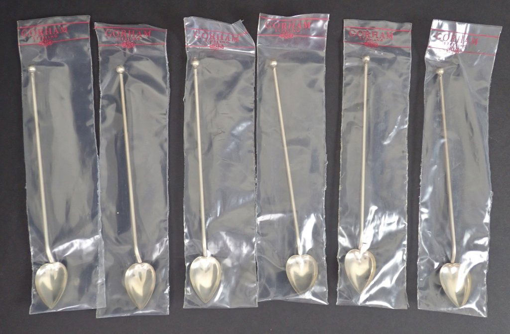 Six Gorham Sterling Silver Iced Tea Spoons: Set of 6 Gorham sterling silver iced tea or mint julep spoons. They are stamped Gorham Sterling and feature a heart shaped spoon with hollow stem for use as a straw.Each is still in its plastic sleeve