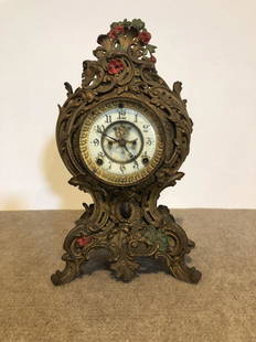 Ansonia Rococo Shelf Clock: Ansonia Rococo shelf clock. Victorian painted metal. ESTATE OF PHILIP GRECO JR. STERLING ASSOCIATES STRIVES TO PROVIDE ACCURATE, OBJECTIVE, & FAIR INFORMATION ON ALL LOTS. WE WILL BE HAPPY TO ANSWER
