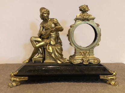 Ansonia Mantel Clock: Mandolin player. Lacking movement.Victorian painted metal. ESTATE OF PHILIP GRECO JR. STERLING ASSOCIATES STRIVES TO PROVIDE ACCURATE, OBJECTIVE, & FAIR INFORMATION ON ALL LOTS. WE WILL BE HAPPY TO