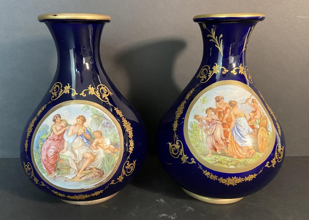 Pair Keramos R. Capodimonte Italy Vases: Two Cobalt Blue Vintage Keramos Capodimonte Italy Vases. Gilt rim and details. Imperfections, old repairs. Height: 11"; Diameter: 7". STERLING ASSOCIATES STRIVES TO PROVIDE ACCURATE, OBJECTIVE, & FAIR