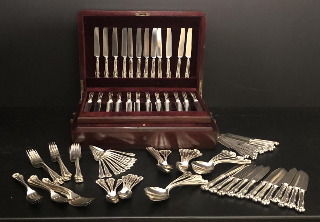 J.E. Caldwell Sterling Flatware: Large set of J.E. Caldwell sterling set of flatware service. Monogrammed. Traditional design with shell and beading. Total of 113 pieces. Includes12-9 1/2" knives. 12-8 3/4? knives. 10-7? knives 12-8 