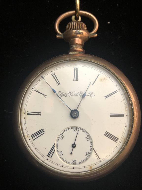Elgin Watch Co. Pocket Watch: Elgin railroad pocket watch. Mixed metal case. Running. ESTATE OF PHILIP GRECO JR. STERLING ASSOCIATES STRIVES TO PROVIDE ACCURATE, OBJECTIVE, & FAIR INFORMATION ON ALL LOTS. WE WILL BE HAPPY TO ANSWE