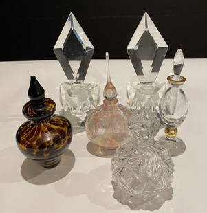 Collection of 6 Perfume Bottles: Collection of 6 Perfume Bottles. Signed. Tiffany. Art glass. Mid century. STERLING ASSOCIATES STRIVES TO PROVIDE ACCURATE, OBJECTIVE, & FAIR INFORMATION ON ALL LOTS. WE WILL BE HAPPY TO ANSWER ANY