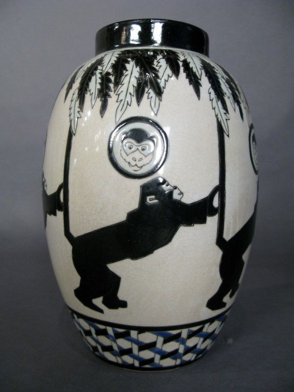 Earthenware art deco vase: Glazed earthenware art deco vase signed on bottom 11 3/8"T, 6 1/2"W, 4" Top Diameter