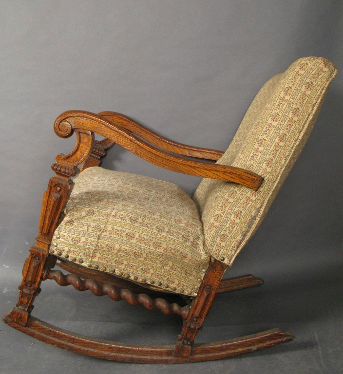 Victorian rocking chair, circa 1880: Victorian oak rocking chair, circa 1880, American 35"T, 27"L Seat: 18" deep, 23"L Base: 25"L, 23"W