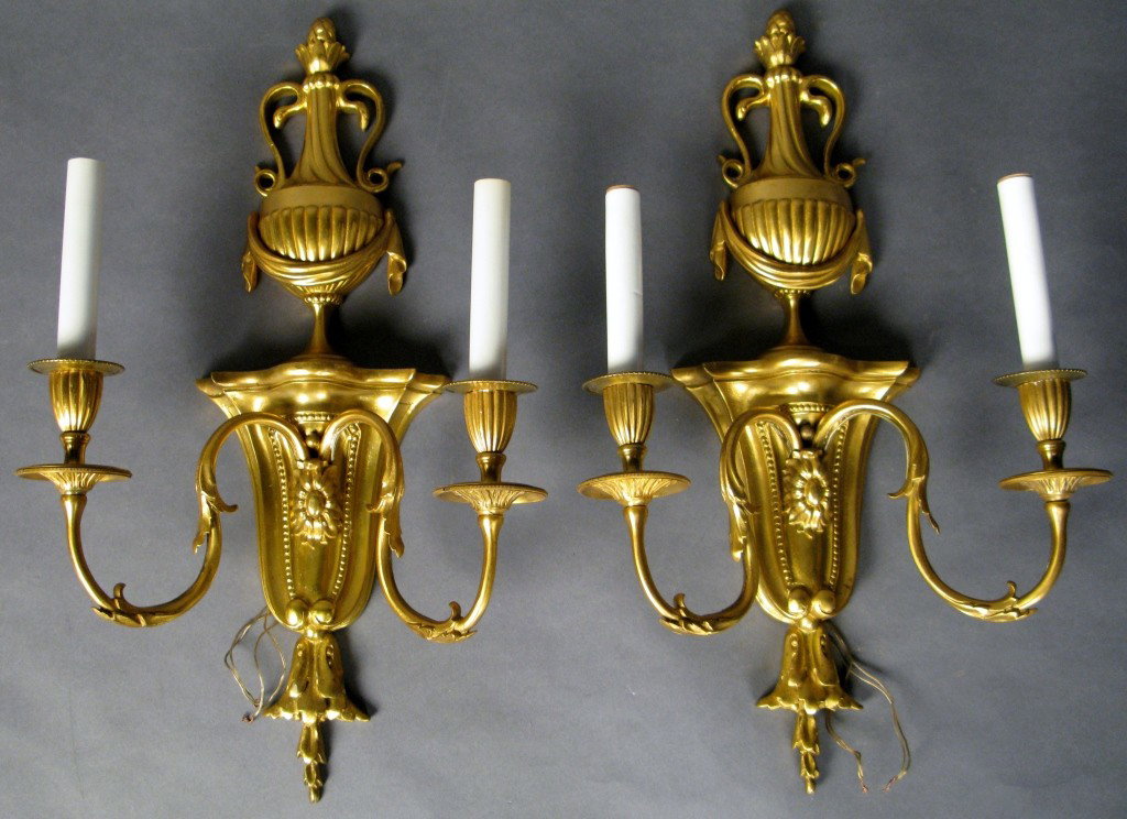 Pair of Caldwell sconces, circa 1910: Caldwell, circa 1910, American Pair of doré bronze twin arm wall sconces signed outside wire 21T", 12"L, 5 1/2"W