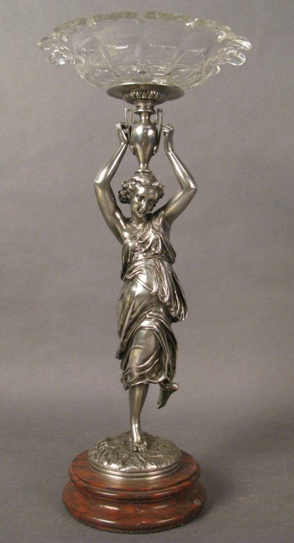 Machault (1800-1866) French, figural center piece: Paul Emile Machault (1800-1866) French Woman holding vase signed: Machault Silver over bronze, marble, and cut glass bowl 17"T Base: 5 1/2" diameter Glass: 7 3/4" diameter, 1 1/2" deep