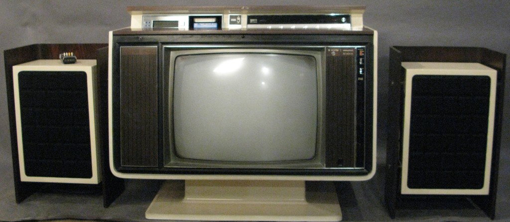 Modern TV, speakers, & remote: Modern TV, 2 speakers and remote TV: 23 1/4"T, 38 7/8"L, 21"W Speaker: 25 3/4"T, 16"L, 10 3/4"W