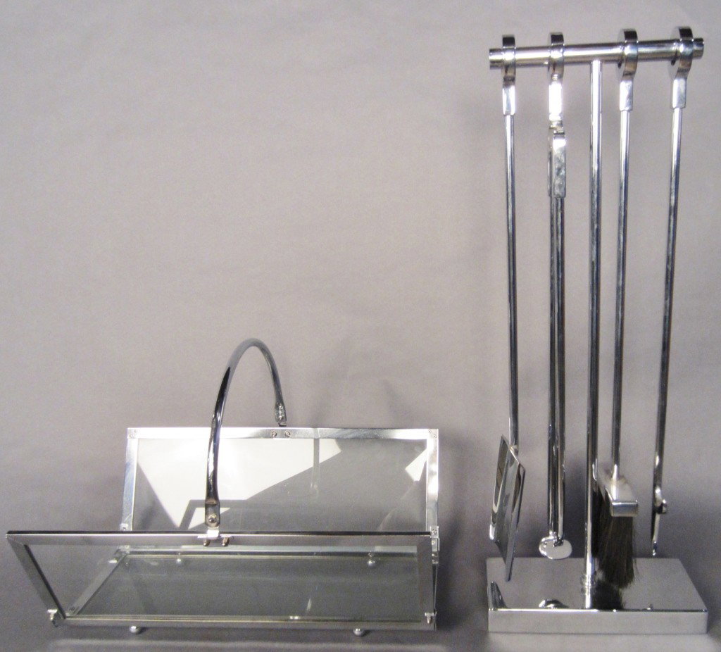 Modern fireplace set: Modern chrome fireplace set Firewood valet, shovel, broom, tongs, & poker on stand Valet: 15"T (including handle), 20"L, 14"W Stand: 30 1/4"T
