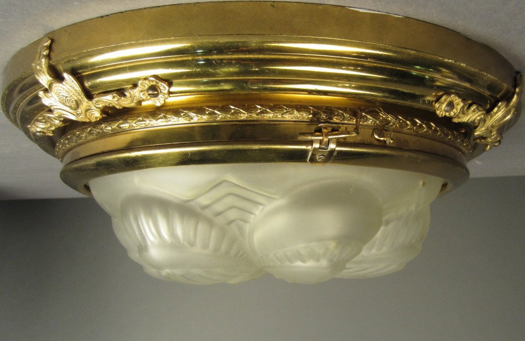 Art Deco Brass and molded glass ceiling light: Art Deco Brass and molded glass ceiling light, circa 1920, 4 lights Height: 6 ½", Width: 18 ¼"