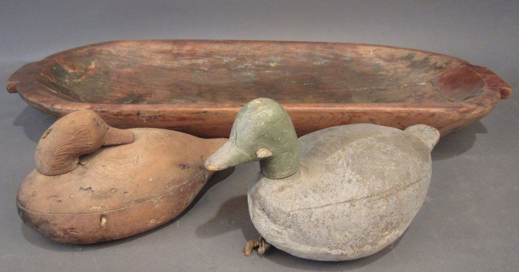 Antique Duck Decoys & Carved Bowl: 2 Antique carved wood duck decoys with carved wooden bowl. Bowl: Height: 4 5/8", Width: 32 3/8" Decoys: Tallest height: 7 3/4", Longest width: 13 1/2"