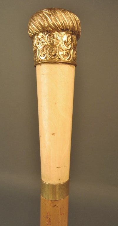 Antique Walking Stick with Ivory and Metal Knob: Antique wood walking stick with ivory and metal knob. Hidden compartment with tool kit. Length: 34"