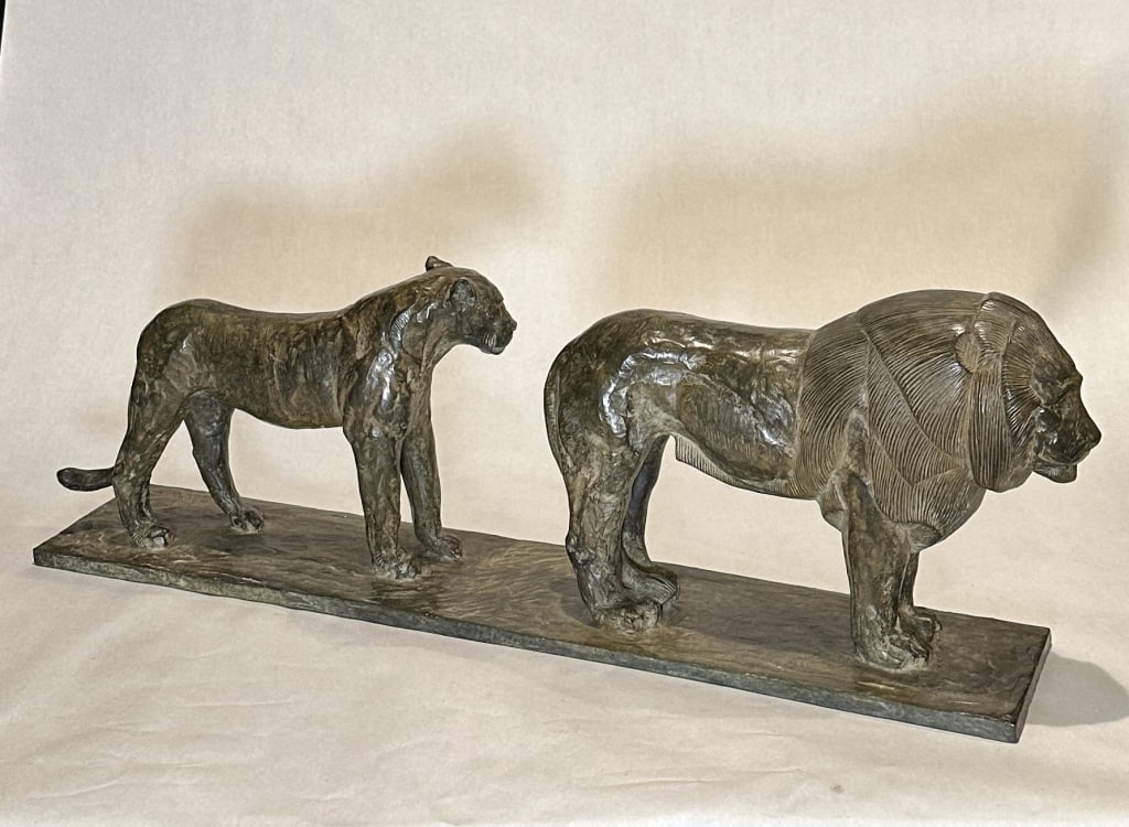 Bronze Lions After Rembrandt Bugatti Lion et lionne de Nubie after Rembrandt Bugatti Nubian lion and: Bronze Lion et lionne de Nubie after Rembrandt Bugatti. Nubian lion and lioness Nice quality. well cast. OA measurement 34" x 5.75" x 11.75".STERLING ASSOCIATES STRIVES TO PROVIDE ACCURATE, OBJECTIVE,