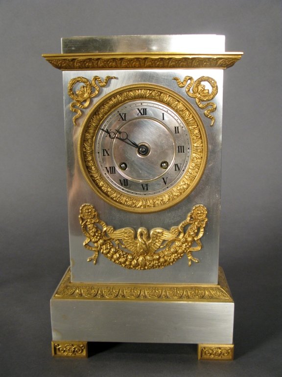 Silvered & Dore over Bronze Clock, early 19th C: Silver and doré bronze clock, early 19th century silk thread height 11 3/4", width 6 3/4"