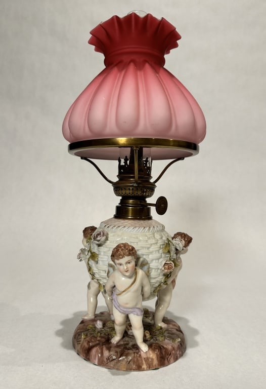 German Porcelain Figural Oil Lamp German porcelain figural oil lamp. 19th century. 3 cupid, winged (1 of 4)
