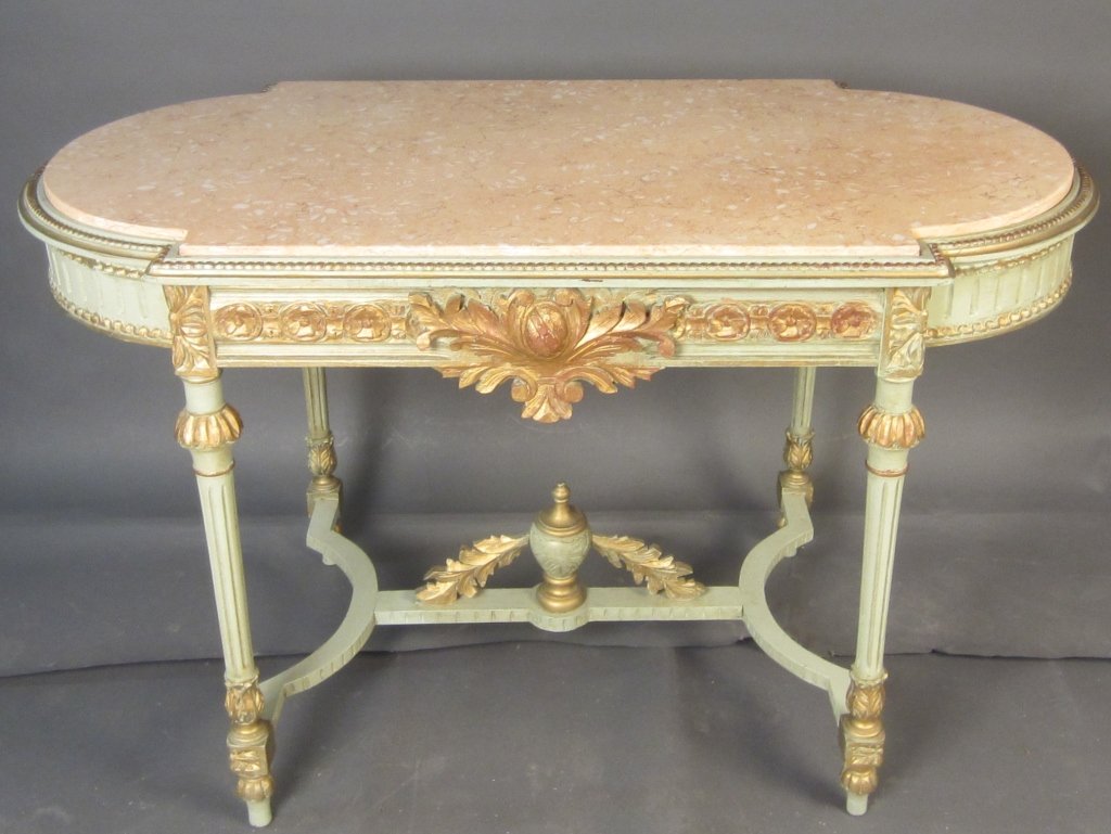Pink Marble Top Center table, Louis XVI Style: Pink marble top painted and gilt center table, Louis XVI style. 19th Century Height: 31", Width: 51"