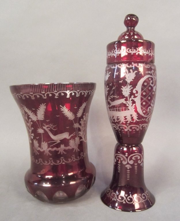 Cranberry Bohemian Cut to Clear Glass: Cranberry Bohemian cut to clear glass vase and covered garniture vases. Some damages and losses. Heights vary: 7 1/2" - 12"