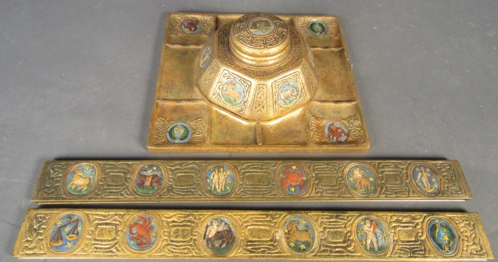 Tiffany Studios Zodiac Inkwell & Blotter Ends: Tiffany Studios dore over bronze and painted Zodiac inkwell & blotter ends. Stamped: Tiffany Studios 988 Height of inkwell: 4", Width: 9 3/4", Length of blotter: 19 5/8"