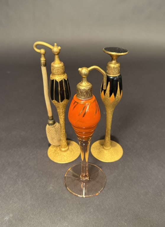 Collection Of 3 DeVilbiss Perfumes And Atomizers: Tallest 7.5". The Estate of the late Judy Boyd, New Jersey.STERLING ASSOCIATES STRIVES TO PROVIDE ACCURATE, OBJECTIVE, & FAIR INFORMATION ON ALL LOTS. WE WILL BE HAPPY TO ANSWER ANY QUESTIONS AND PROV