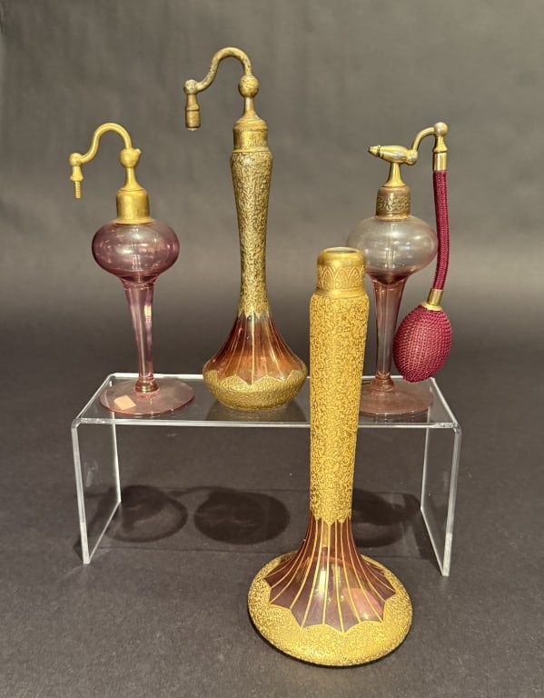 Collection Of 4 DeVilbiss Perfumes And Atomizers: Tallest 8". The Estate of the late Judy Boyd, New Jersey.STERLING ASSOCIATES STRIVES TO PROVIDE ACCURATE, OBJECTIVE, & FAIR INFORMATION ON ALL LOTS. WE WILL BE HAPPY TO ANSWER ANY QUESTIONS AND PROVID