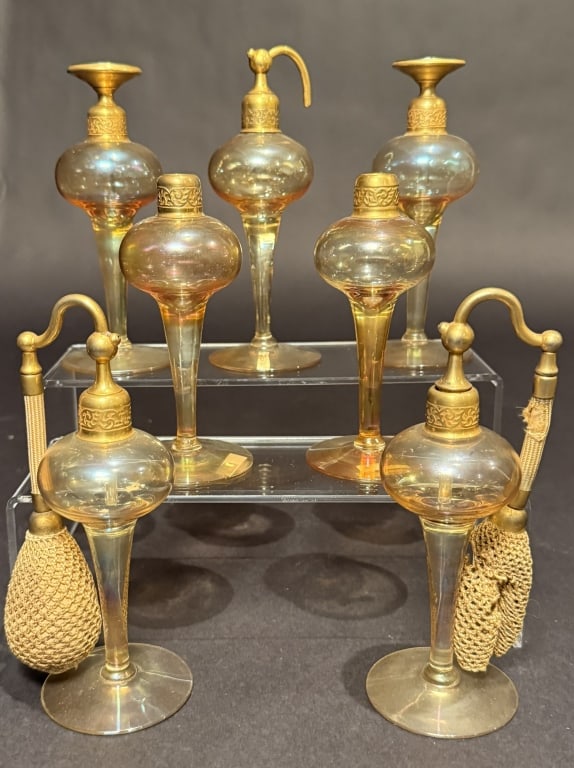 Collection Of 7 DeVilbiss Perfumes And Atomizers: Tallest 6.25". The Estate of the late Judy Boyd, New Jersey.STERLING ASSOCIATES STRIVES TO PROVIDE ACCURATE, OBJECTIVE, & FAIR INFORMATION ON ALL LOTS. WE WILL BE HAPPY TO ANSWER ANY QUESTIONS AND PRO