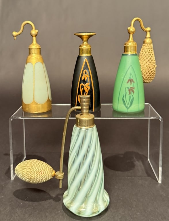 Collection Of 4 DeVilbiss Perfume And Atomizers: Tallest 6". The Estate of the late Judy Boyd, New Jersey.STERLING ASSOCIATES STRIVES TO PROVIDE ACCURATE, OBJECTIVE, & FAIR INFORMATION ON ALL LOTS. WE WILL BE HAPPY TO ANSWER ANY QUESTIONS AND PROVID