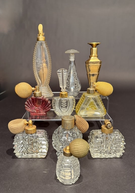 Collection Of 10 DeVilbiss Perfumes And Atomizers: Tallest 7.25". The Estate of the late Judy Boyd, New Jersey.STERLING ASSOCIATES STRIVES TO PROVIDE ACCURATE, OBJECTIVE, & FAIR INFORMATION ON ALL LOTS. WE WILL BE HAPPY TO ANSWER ANY QUESTIONS AND PRO