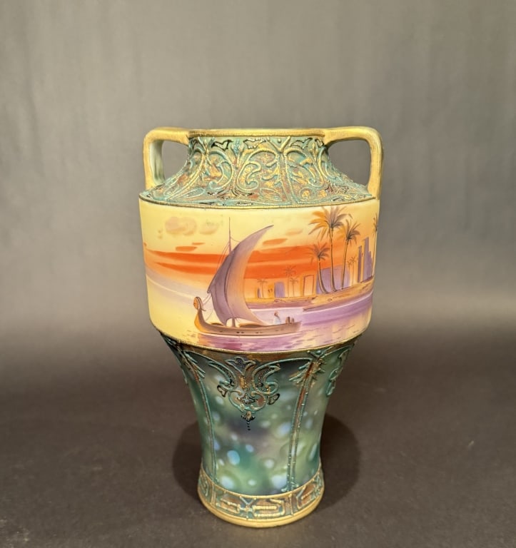 Nippon Egyptian Revival Style Vase: Height 11". The Estate of the late Judy Boyd, New Jersey.STERLING ASSOCIATES STRIVES TO PROVIDE ACCURATE, OBJECTIVE, & FAIR INFORMATION ON ALL LOTS. WE WILL BE HAPPY TO ANSWER ANY QUESTIONS AND PROVID