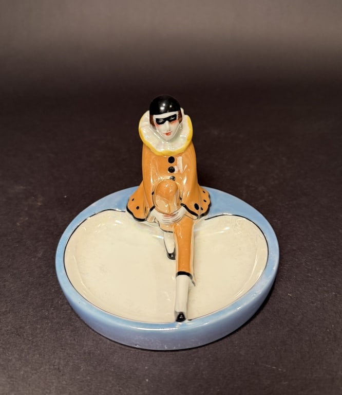 Noritake Art Deco Pierrot Ashtray: Luster. 5" x 3.5". The Estate of the late Judy Boyd, New Jersey.STERLING ASSOCIATES STRIVES TO PROVIDE ACCURATE, OBJECTIVE, & FAIR INFORMATION ON ALL LOTS. WE WILL BE HAPPY TO ANSWER ANY QUESTIONS AND
