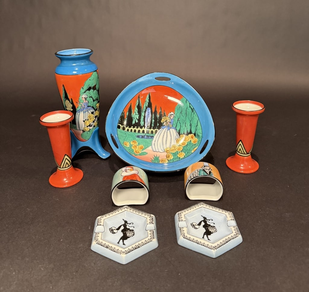 Collection Of 8 Noritake Tabletop Items: Vase 7.5" high. Candy dish 7.75 width. Candle sticks 4.5" high. The Estate of the late Judy Boyd, New Jersey.STERLING ASSOCIATES STRIVES TO PROVIDE ACCURATE, OBJECTIVE, & FAIR INFORMATION ON ALL LOTS.